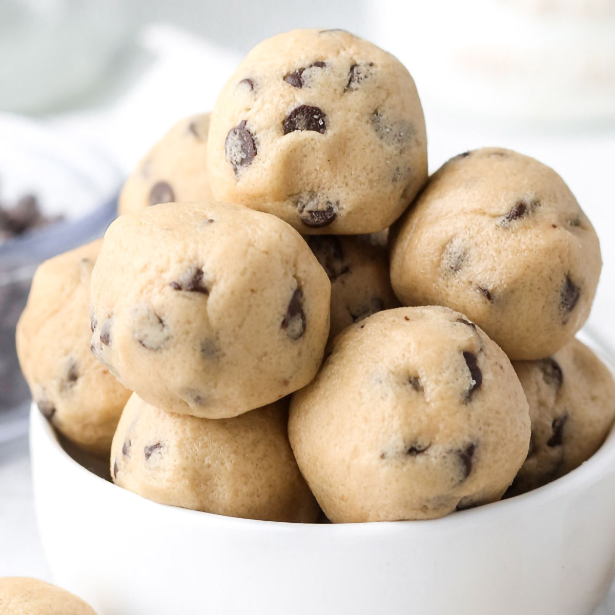 https://www.savorthespoonful.com/wp-content/uploads/2023/03/edible-no-bake-cookie-dough-bites-chocolate.jpg